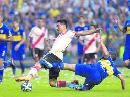 En un torneo de 30 sólo se jugarían 29 fechas, pero habrá una extra para realizar dos Clásicos River-Boca al año. AFP /