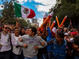 Maestros del CNTE durante marcha en protesta contra el gobierno capitalino. ARCHIVO /