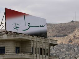 Este es uno de los cartéles de promoción de Bashar Assad, presidente. AFP /