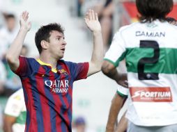 Lio Messi no pudo anotar y dejó a su equipo en suspenso a falta de un juego. AP /