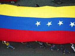 Opositores a Nicolás Maduro marchan por las calles de Caracas. Hace más de tres meses que Venezuela vive en inestabilidad política. AFP /