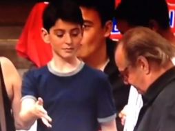 Nicholson parece no haber visto el gesto e ignoró la mano del pequeño. ESPECIAL /