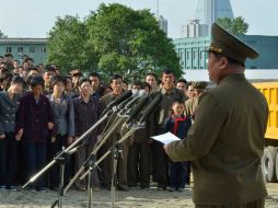 En las calles de Pyongyang, las personas manifestaron su ira a causa del incidente. AP /
