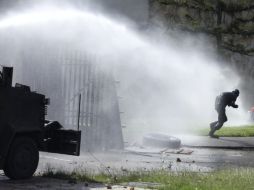 Estudiantes conmemoran que las FARC cumplirán 50 años el próximo 27 de mayo sin empuñar las armas. AP /