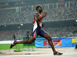 Justin mejoró en cinco centésimas la marca de 2014 y se llevó el primer lugar. AFP /