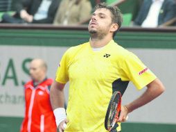 Stanislas Wawrinka se desplomó en el set decisivo y lo perdió 6-0. AFP /