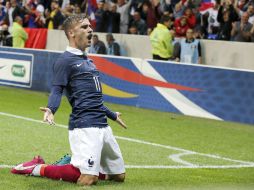 Anthoine Griezmann festeja el gol del empate al minuto 89, uno después de la anotación de Paraguay. EFE /