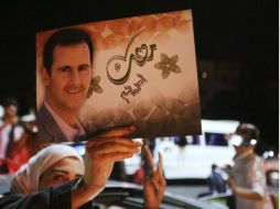 Las elecciones dan el triunfo a Al Asad con el 88.7 por ciento de los votos.  /