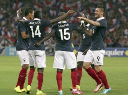 Jugadores de la selección francesa celebran su victoria contra Jamaica en partido amistoso. EFE /