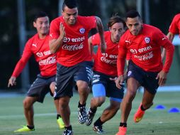 Será la novena participación de La Roja en la máxima justa del futbol. AFP /