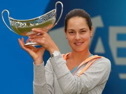 Ana no tuvo problemas en el duelo final para llevarse el trofeo. AFP /