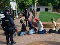 Son detenidos por portar armas de uso exclusivo del Ejército. AFP /