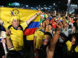 Colombia celebra el pase de su Selección a los cuartos de final en el Mundial de Brasil 2014. AFP /