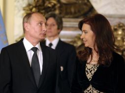 Vladimir Putin y Cristina Fernández luego de su reunión en la presidencial Casa Rosada, en Buenos Aires. AFP /