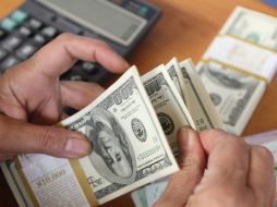 El dólar libre abre con un retroceso marginal de un centavo, comparado con el pasado viernes. ARCHIVO /