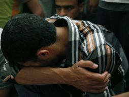 Familiares de Mohammed Abu Khdeir lloran su pérdida, la víctima fue elegida al azar por los asesinos. AP /