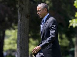Obama pidió a sus asesores mantenerlo informado sobre el avión malasio. AP /
