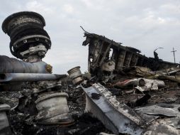 Ucrania y EU acusan a milicias separatistas prorrusas de haber derribado el avión malasio con 298 pasajeros a bordo. AP /