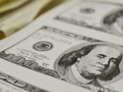 Banco Base estima que el tipo de cambio oscile entre 12.90 y 12.96 pesos por dólar. ARCHIVO /