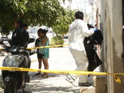 Personal del IJCF acudió al lugar para realizar las investigaciones del caso.  /