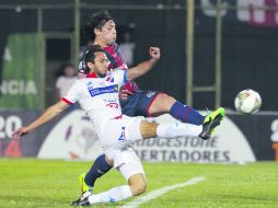 Más agónico, imposible. Literalmente en la última jugada del partido, Santa Cruz prendió así el balón para igualar el marcador. AP /