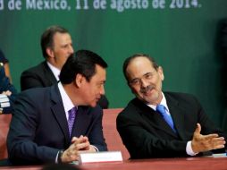 Osorio Chong y  Madero participaron en la ceremonia de  promulgación de las leyes secundarias de la reforma energética. ESPECIAL /