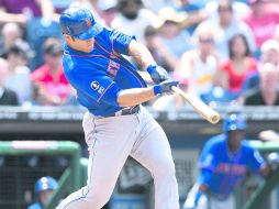 Para la calle. Anthony Recker conecta, con cuenta llena, una recta que escondió detrás de la barda del jardín izquierdo. AFP /