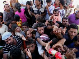 El Vaticano denuncia las masacres sólo a causa de la pertenencia religiosa contra las minorías cristianas y otros grupos religiosos. AP /