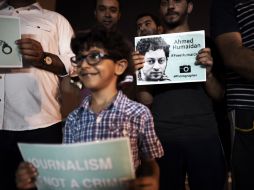 Manifestantes piden la liberación del fotógrafo y activista. AFP /