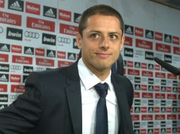 El mexicano señaló que el no merece estar en el banquillo para demostrar que esta en el once del 'mejor club del mundo'. AFP /