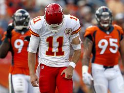 Alex Smith no pudo anotar el la última serie para llevar el partido a tiempo extra. AP J.Mahoney  /