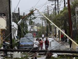 La península también es azotada por el huracán 'Odile' de categoría I. AFP  R. Schemidt  /
