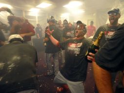 Los Nacionales de Washington celebraron así el título de la División Este en el vestidor. AP  D. Tulis  /