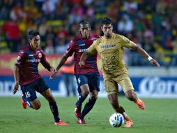 Los universitarios derrotaron 3-2 a los purépechas, lo que provocó que aficionados entraran a la cancha. MEXSPORT / ARCHIVO