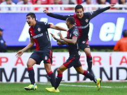 Enrique Pérez festeja el gol que marcó al minuto 24 para el Atlas. MEXSPORT / A. Macías