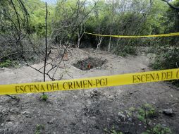Vista de la fosa clandestina en Pueblo Viejo, cerca de la ciudad de Iguala. AFP / P. Pardo