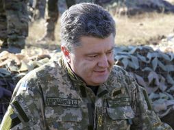 ''Tengo mucha experiencia en negociaciones diplomáticas complejísimas. Pero soy optimista'', subraya Petro Poroshenko. AFP / M. Palinchak