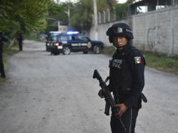 Exigen justicia para 'descubrir y aplicar la ley a los responsables' por la muerte y desaparición de 43 estudiantes. AFP / Y. Cortez