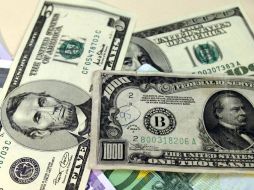 El tipo de cambio para solventar obligaciones en moneda extranjera pagaderas en el país es de 13.4203 pesos. EL INFORMADOR / ARCHIVO