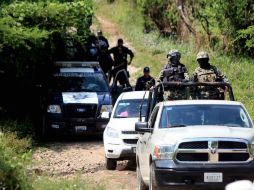 Autoridades del gobierno y de la CNDH se suman a la búsqueda en las faldas del Cerro de la Parota. SUN / ARCHIVO
