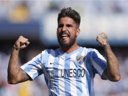 Samuel García anota el primer tanto del Málaga antes de que se cumpliera el primer minuto del juego. EFE / J. Zapata