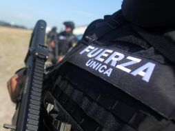 Los oficiales fueron despojados de sus armas para llevarlos al Ministerio Público. EL INFORMADOR / ARCHIVO