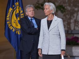 Gerry Rice (i) destaca que el anuncio estuvo apoyado por las 'continuas mejoras' en la economía de EU. AFP / ARCHIVO