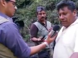 Un hombre no identificado niega la versión de la PGR sobre el hallazgo de huesos humanos en un tiradero de Cocula. YOUTUBE / ValorporTamaulipas