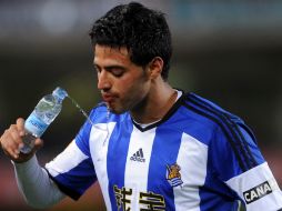 Carlos anotó un gol al Atlético, campeón de España y su equipo ganó el juego. AFP / ARCHIVO
