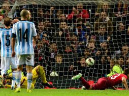 Raphael Guerreiro anota al minuto 90+1. AFP / P. Ellis