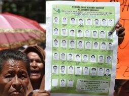La Comisión Nacional de Derechos Humanos mantendrá contacto con los representantes de los familiares de los normalistas. AFP / ARCHIVO