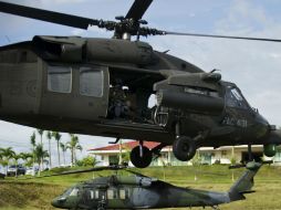 Los rebeldes acuerdan junto al gobierno colombiano la libertad del general y otras cuatro personas. AFP / L. Robayo