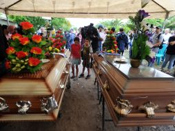 Los cuerpos de las jóvenes salieron del barrio Galeras, donde vivían con su madre. AFP / O. Sierra