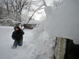 El Servicio Meteorológico Nacional informa este viernes que espera que continúe la tormenta durante este día. AFP /